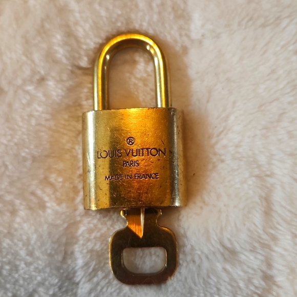 Louis Vuitton Accessories - Lv lock 305 , 303 , 310, 317